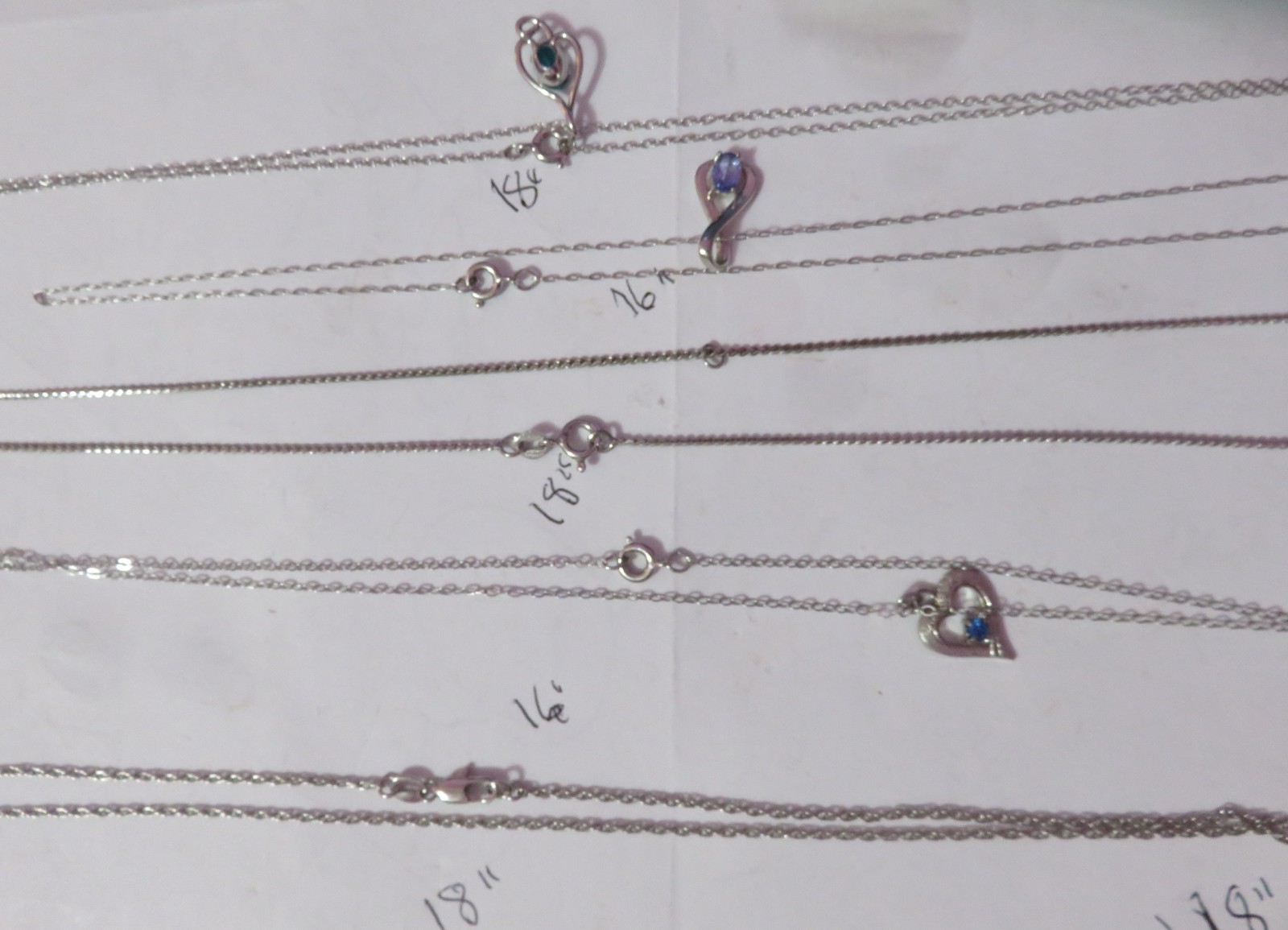 4 MARKED “STERLING” SILVER & ONE BGE CHAIN NECKLACES & 3 PENDANTS 8 GRAMS