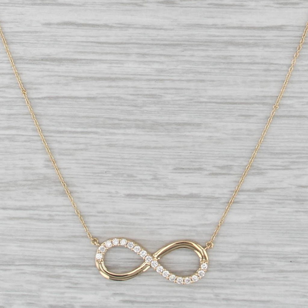 0.16ctw Diamond Infinity Knot Pendant Necklace 18k Yellow Gold 16.25-17.75″