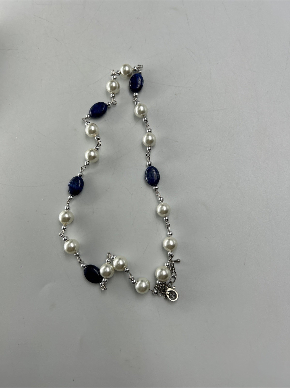 beautiful Fashion necklace with faux pearl and blue stones And Bracelet