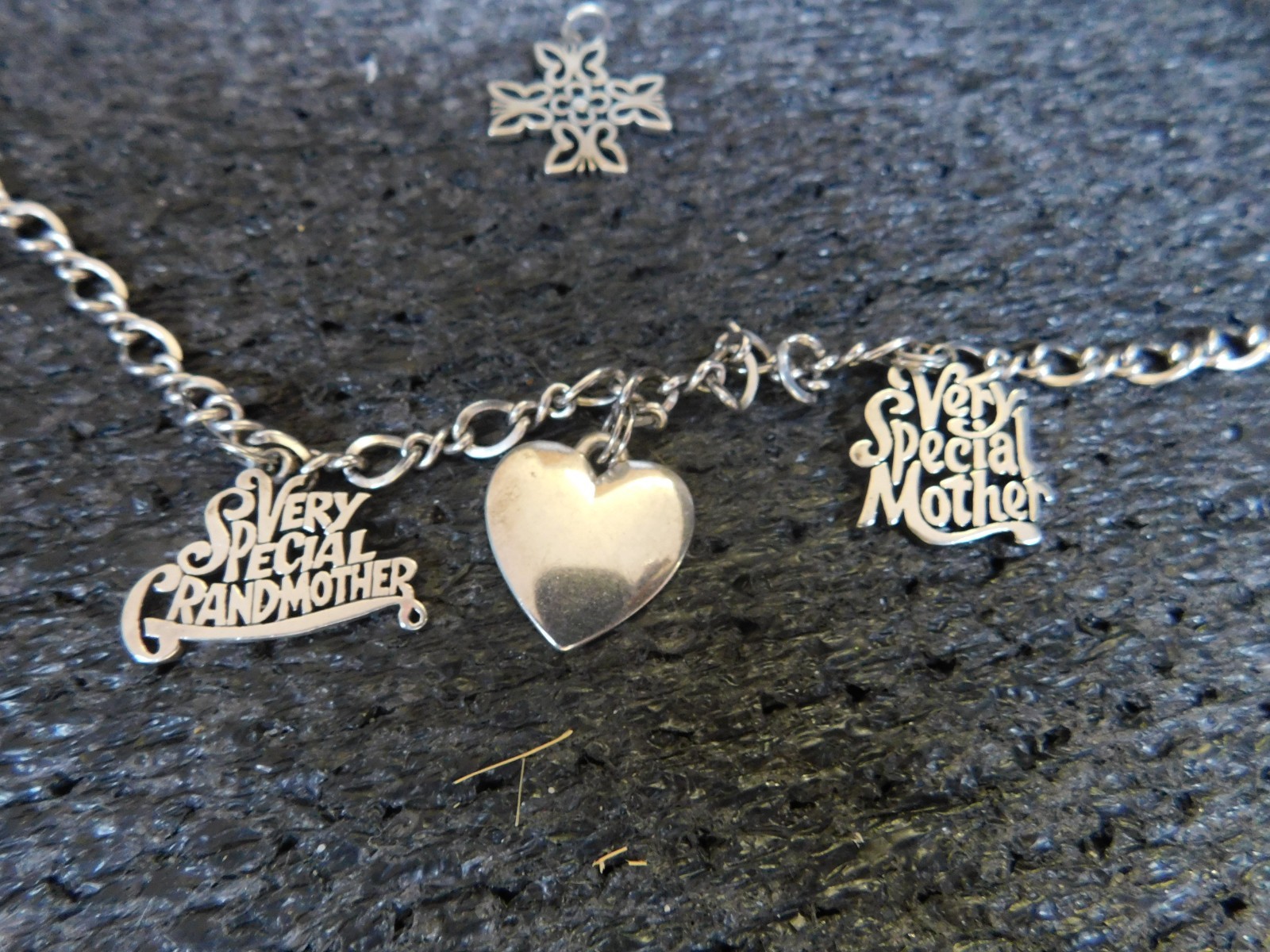 JAMES AVERY 30″ SIVER CHAIN WITH THREE CHARMS ON NECKLACE AND ONE CHARM LOOSE