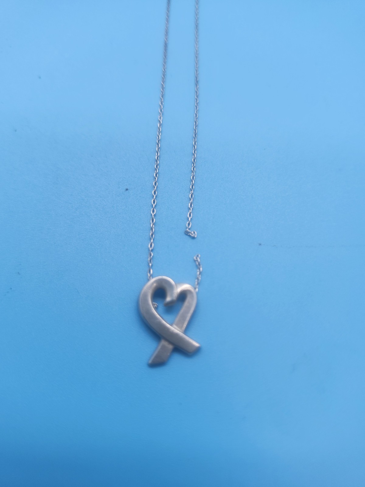 READ DESCRIPTION:Tiffany & Co. Paloma Picasso Loving Heart Ribbon Pendant
