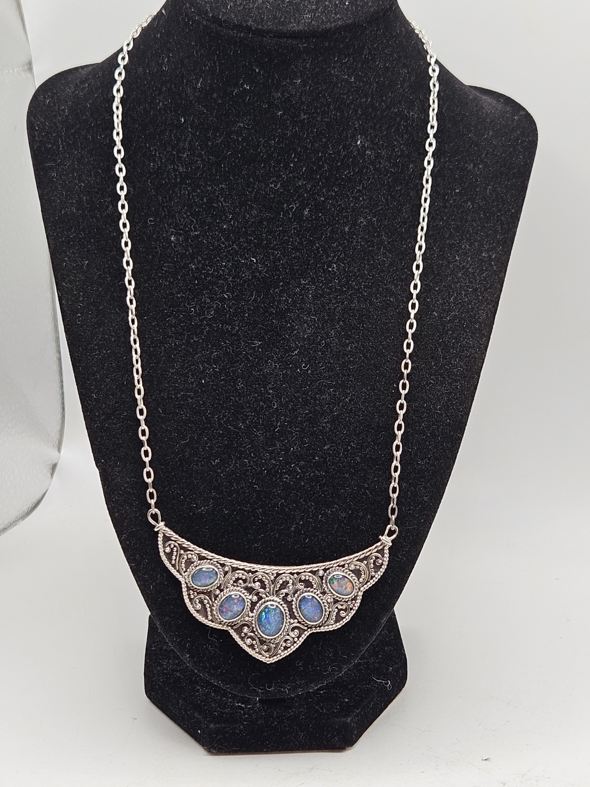 Sterling Silver Bib Style Necklace With 5 Oval Bezel Set Opals. 20″ Marked. 925.