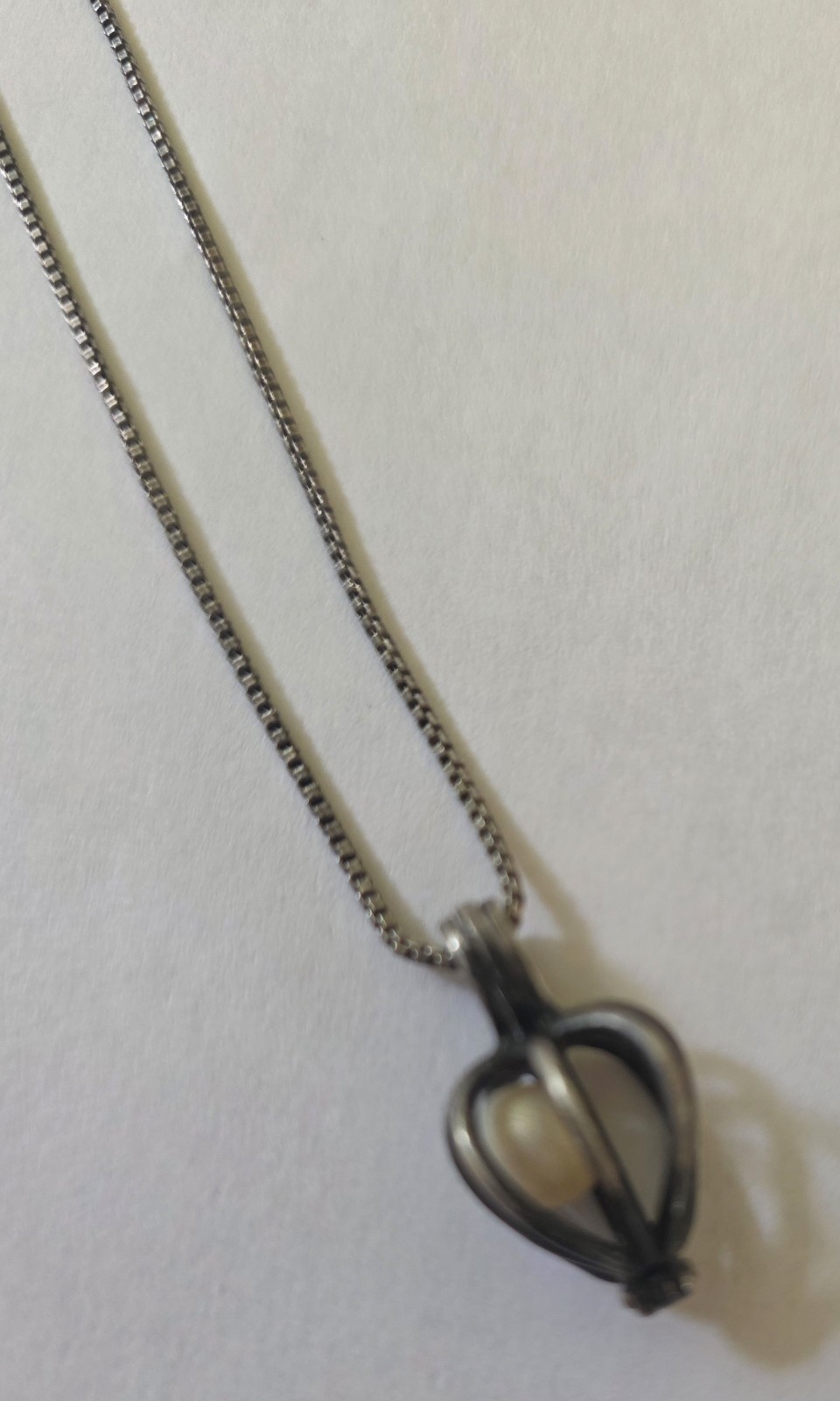 19″ Sterling Silver Box Chain With A Pearl In A Heart Cage