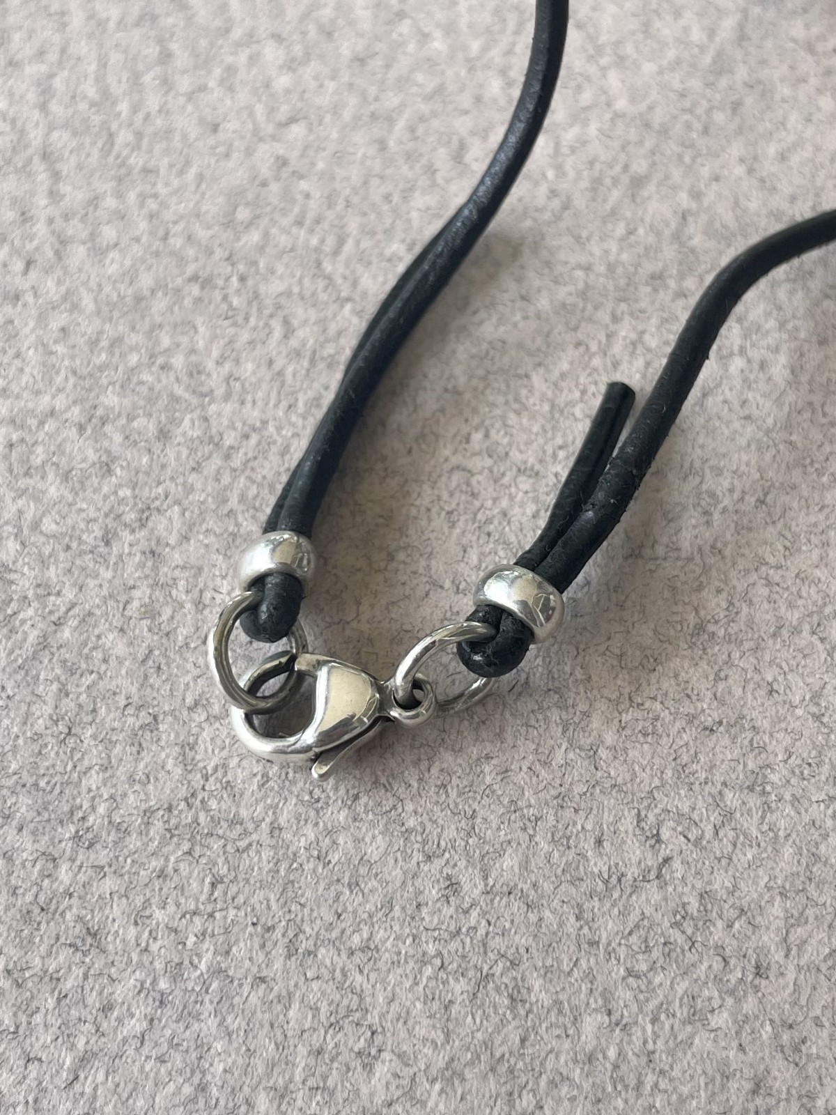 James Avery Sterling Inward Light Cross Pendant with Black Cord 16.25″