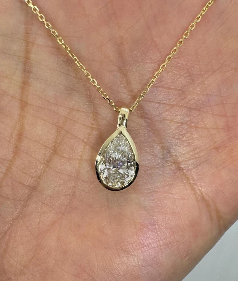 2Ct Pear Cut Moissanite Tear Drop Bezel Solitaire Pendant 14K Yellow Gold Plated