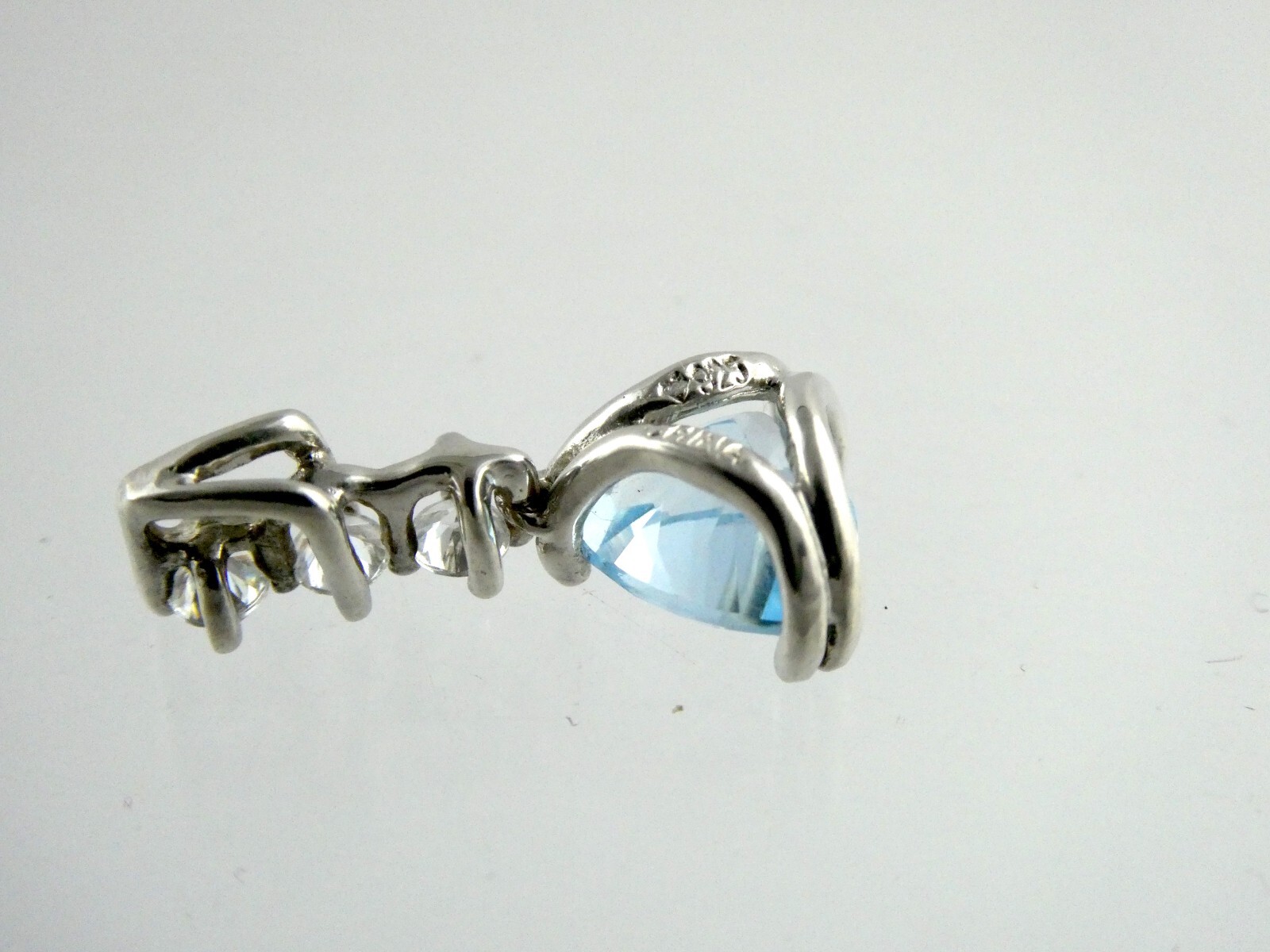 Sterling Silver Blue Topaz White CZ Pendant Trillion and Round Cuts 925 .75 Inch