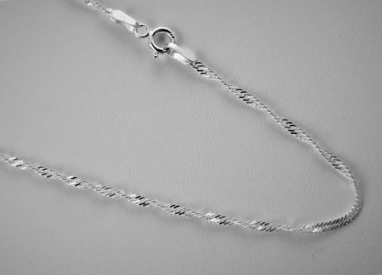 1.5mm Singapore Rhodium plated over 925 Sterling Silver Chain 16,18,20,22,24,30″