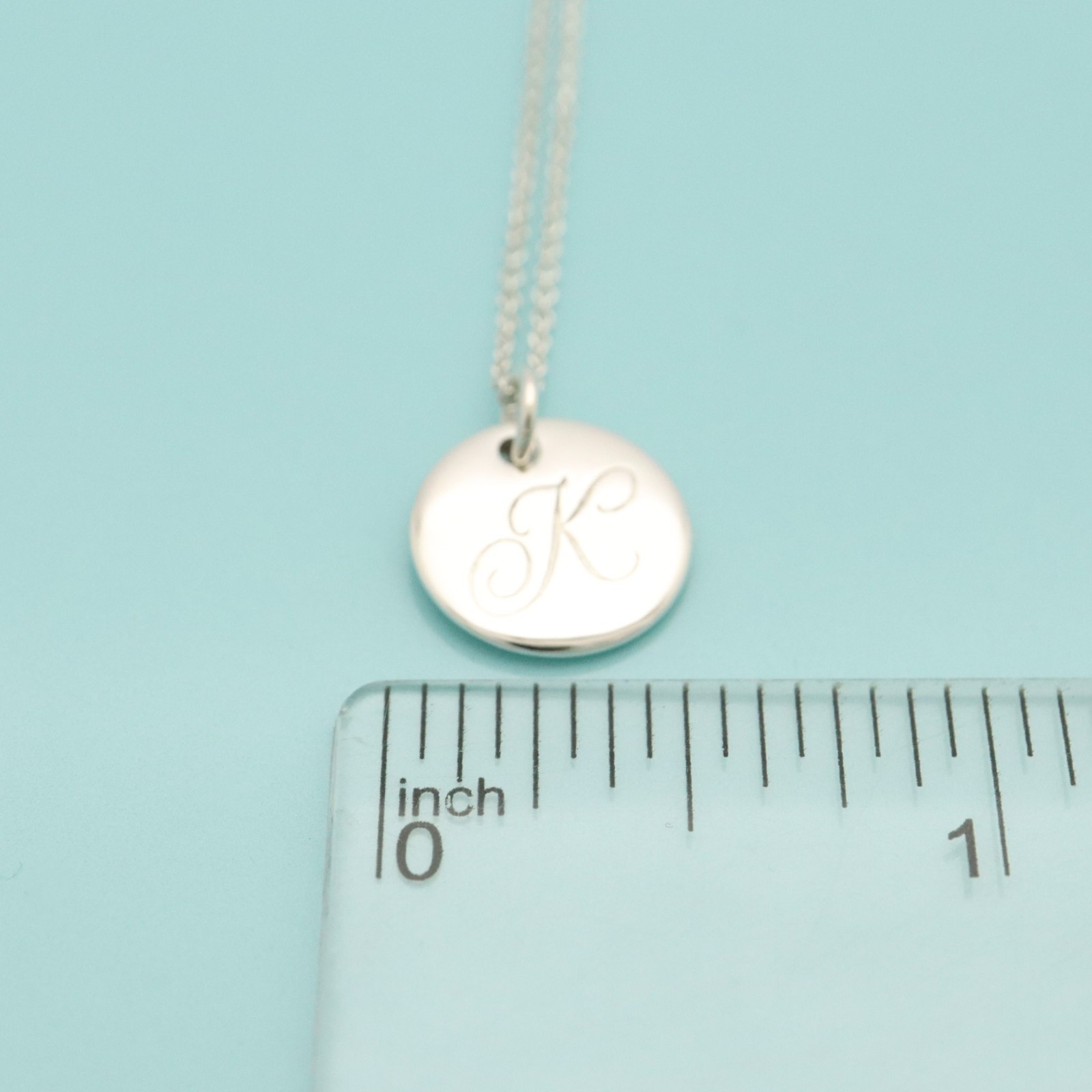 Tiffany & Co. Letter K Notes Alphabet Initial Disc Necklace 16.2″ Silver 925