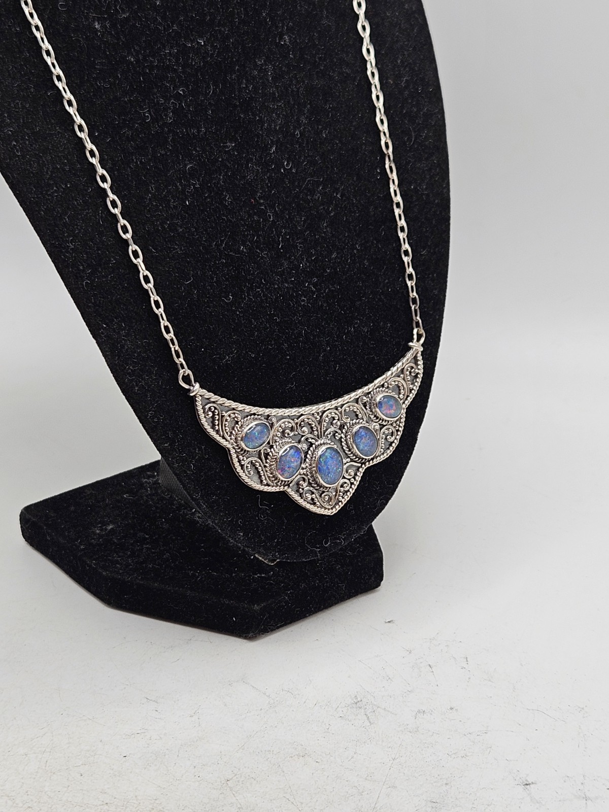 Sterling Silver Bib Style Necklace With 5 Oval Bezel Set Opals. 20″ Marked. 925.