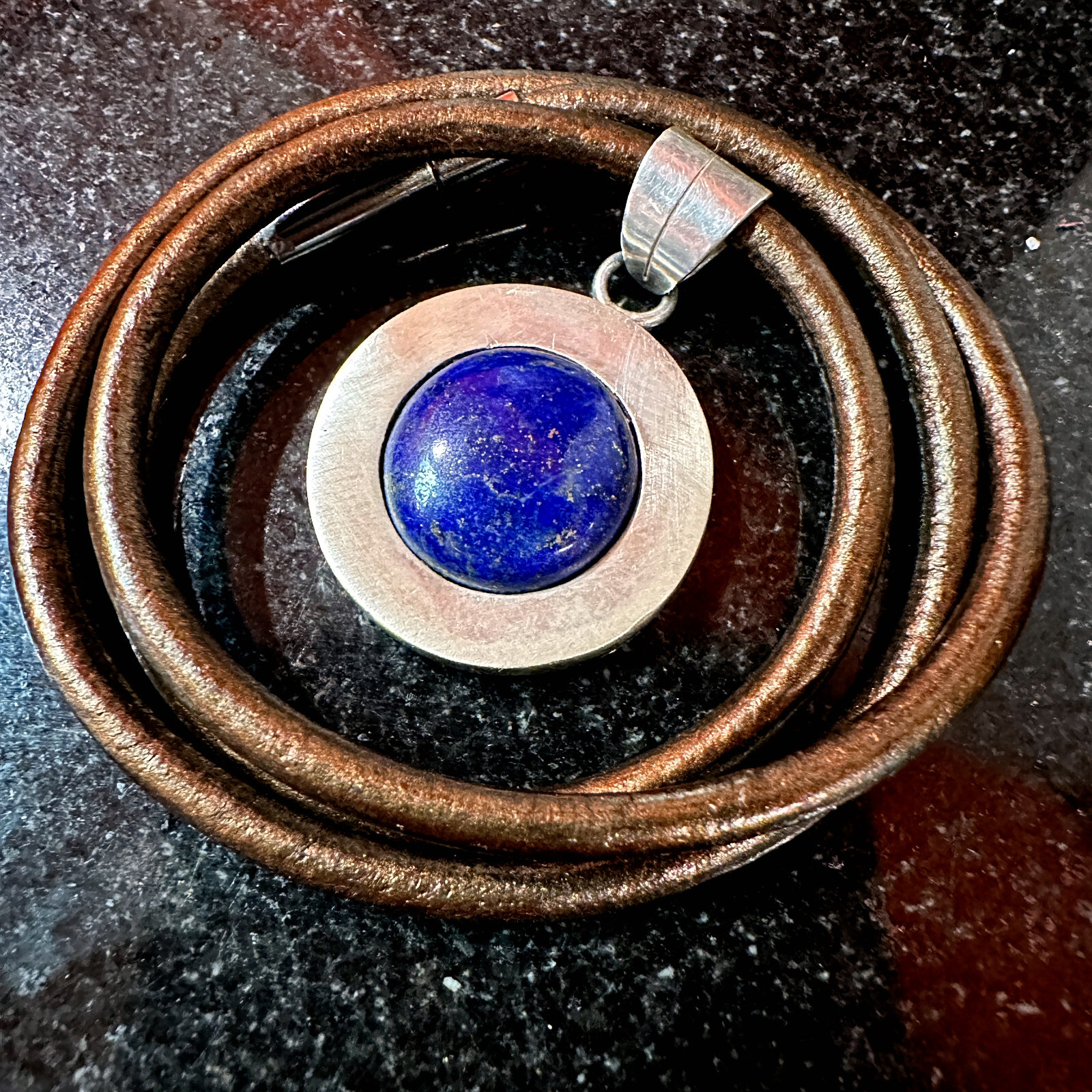 Lapis Cabochon Pendant in Sterling Silver on 16.5″ Metallic Brown Leather Cord