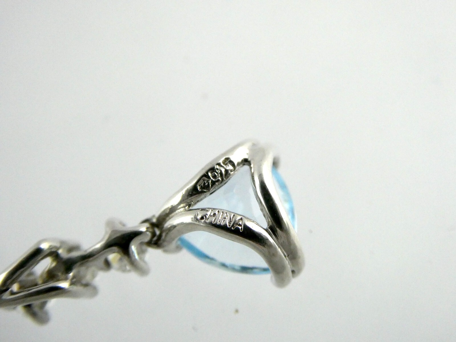 Sterling Silver Blue Topaz White CZ Pendant Trillion and Round Cuts 925 .75 Inch