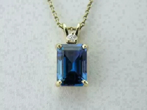 2Ct Emerald Cut Blue Sapphire Women’s Solitaire Pendant 14K Yellow Gold Finish