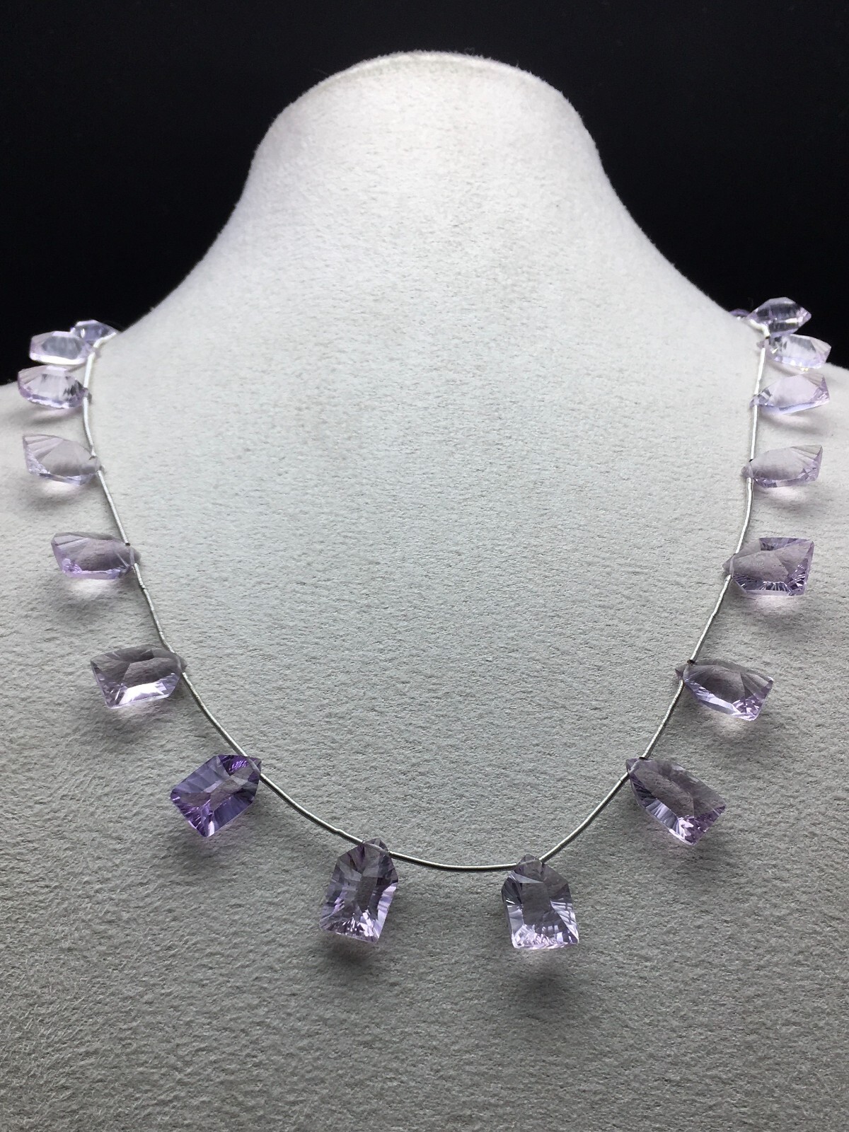 Natural LIGHT AMETHYST/Fancy/Concave/7x11M till 8x14MM/105.60 Cts/19″/$ 301.00