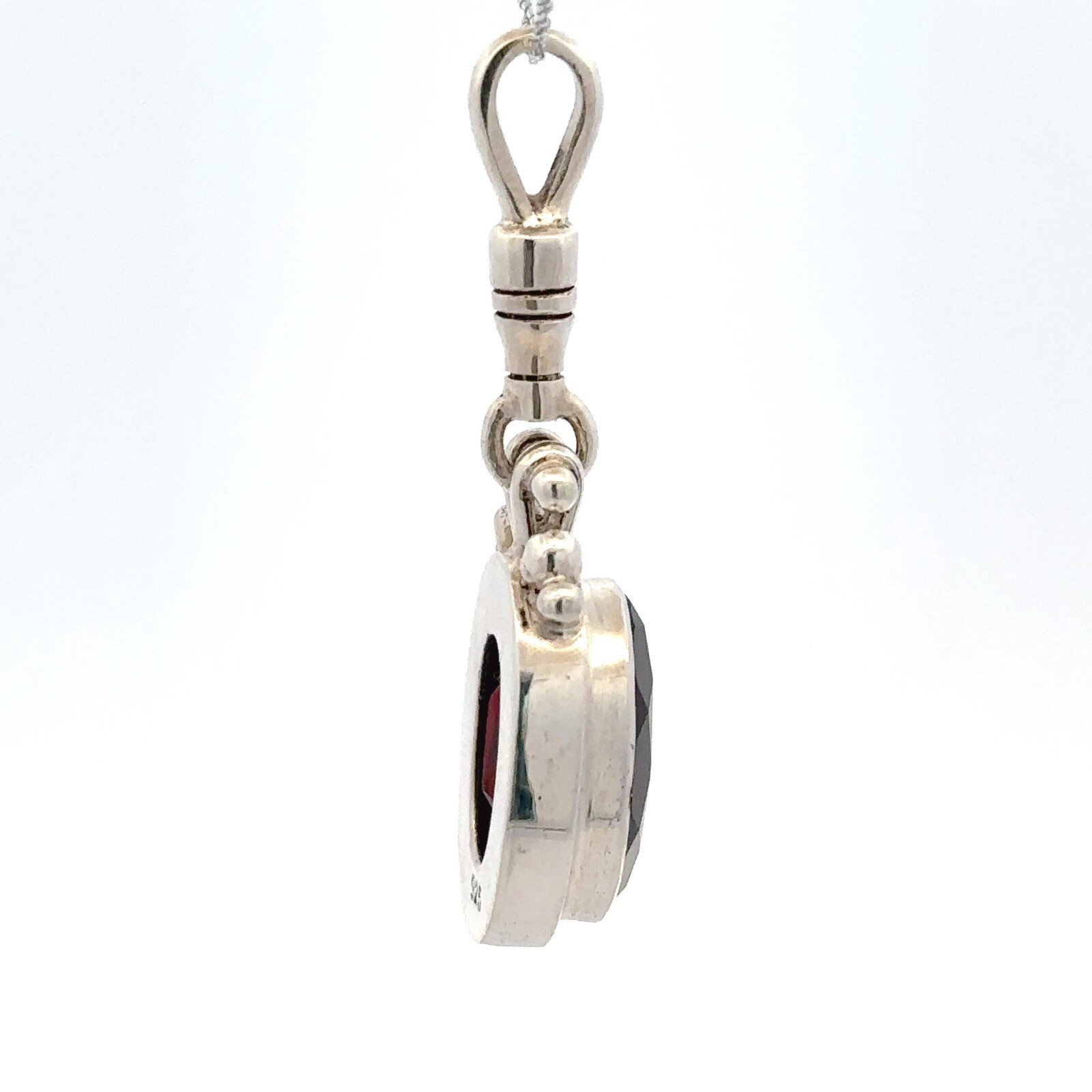 Sterling Silver Oval Garnet Pendant (1/2 x 1 1/2 Inch)