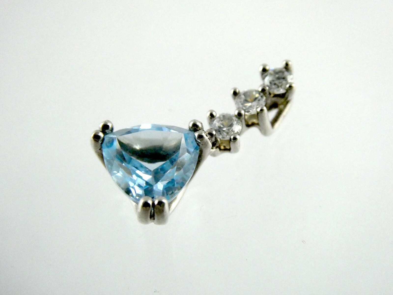 Sterling Silver Blue Topaz White CZ Pendant Trillion and Round Cuts 925 .75 Inch