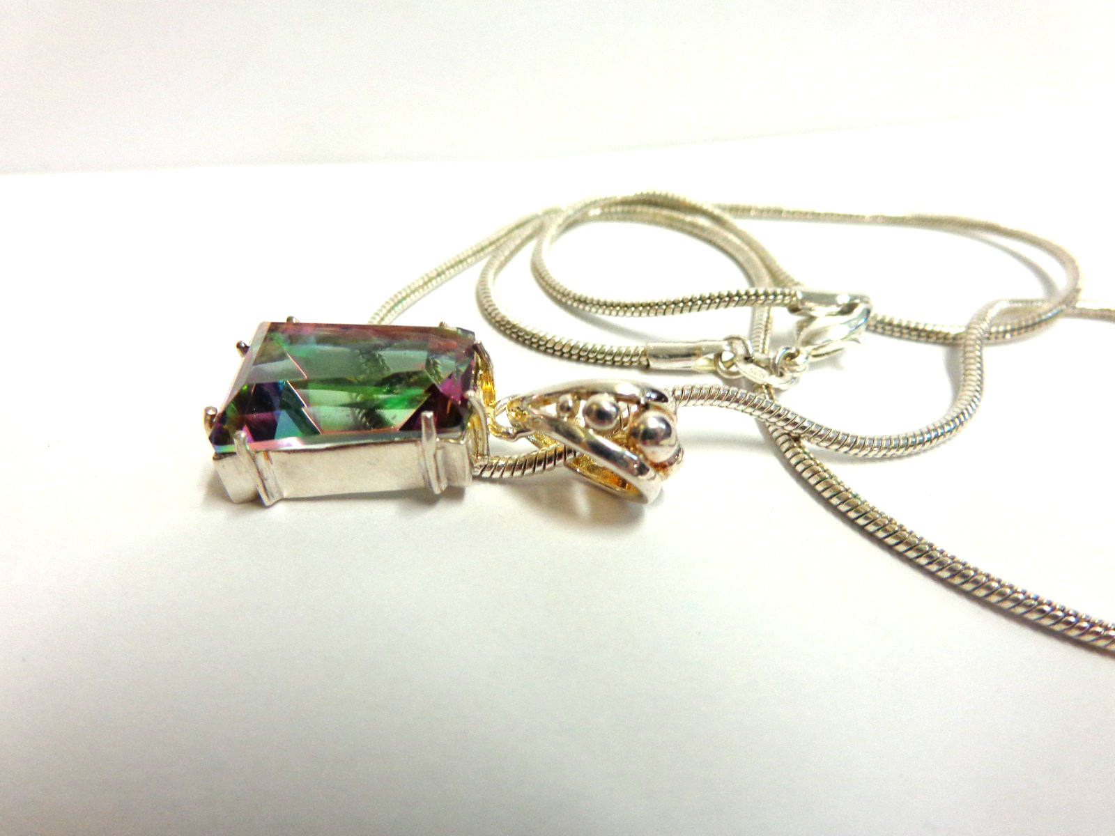sterling silver mystic topaz necklace sz 21 in lg w/1.25 in pend/wgt 16 gr tcw 6