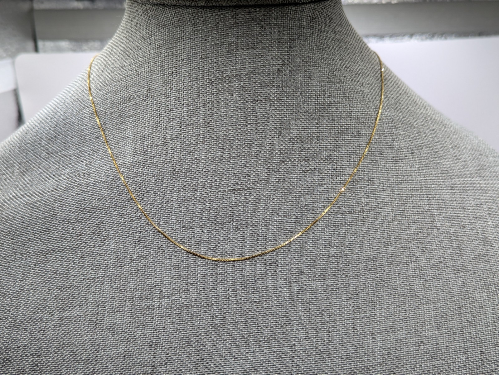 14k Adjustable box chain 16-18″ .6mm with lobster Milor brandclasp