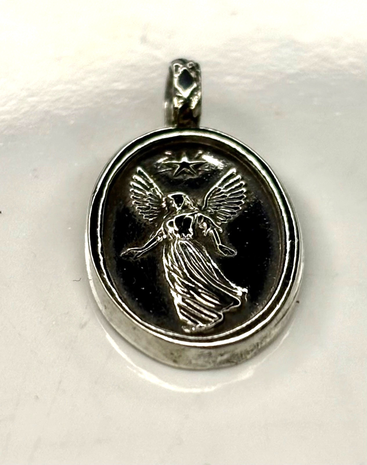 Fine pure Silver 999. guardian angel Minimalist Pendant