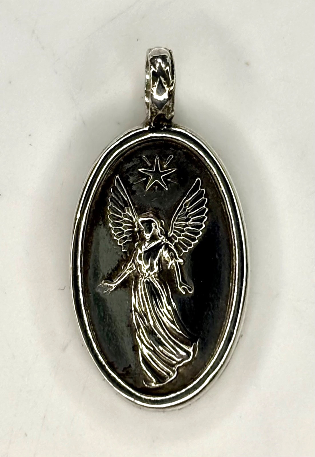 Fine pure Silver 999. guardian angel Minimalist Pendant