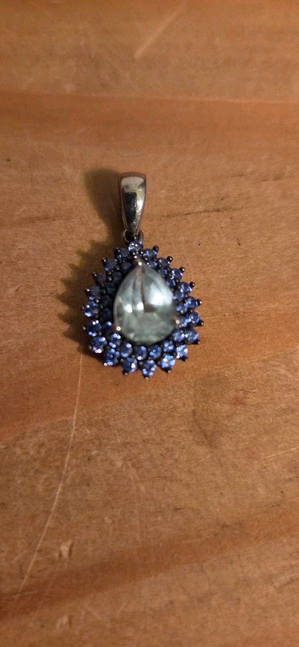 Sterling Silver Blue Topaz Pendant . Tear Drop Shaped. Marked 925 RUF China