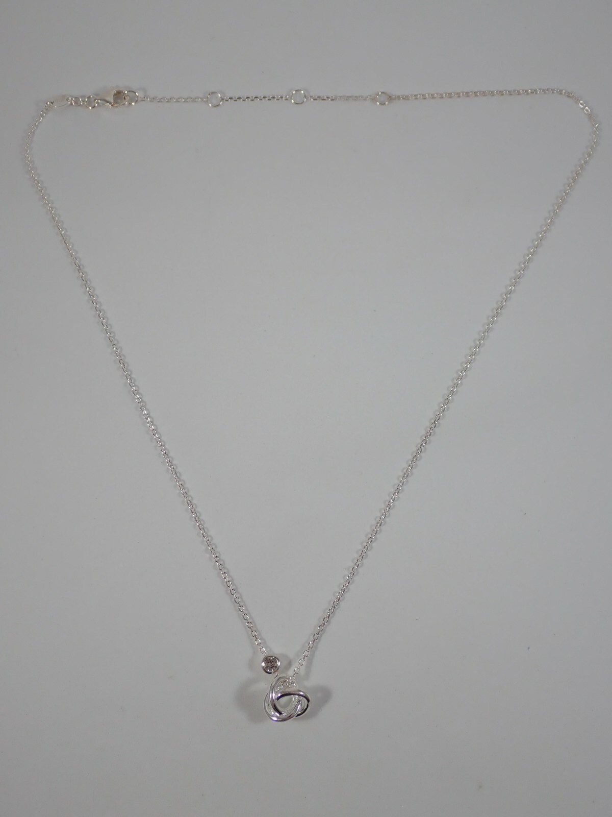 LINKS OF LONDON 925 STERLING SILVER w/ WHITE TOPAZ LOVE KNOT PENDANT NECKLACE