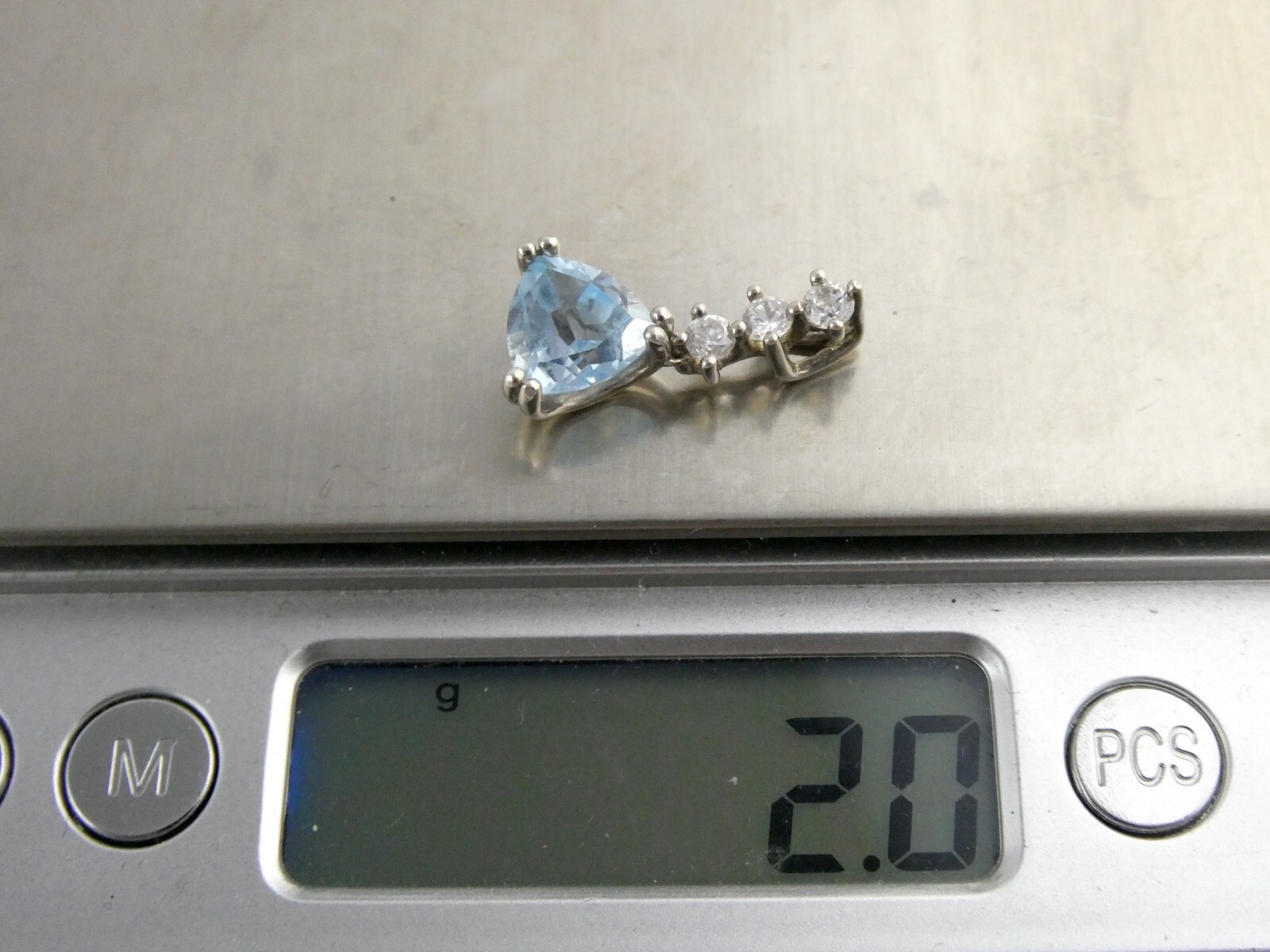 Sterling Silver Blue Topaz White CZ Pendant Trillion and Round Cuts 925 .75 Inch