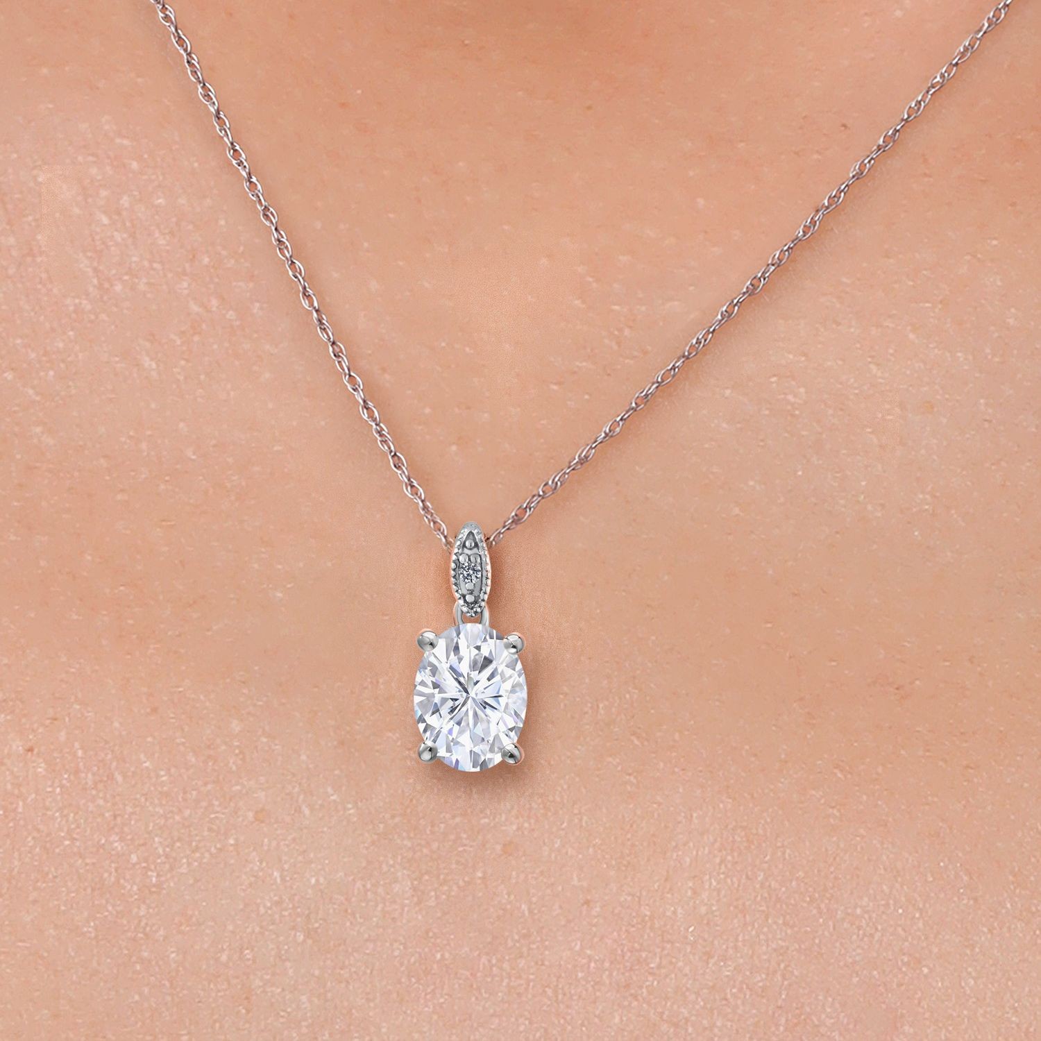 10K White Gold Pendant Near Colorless Oval Moissanite and Diamond