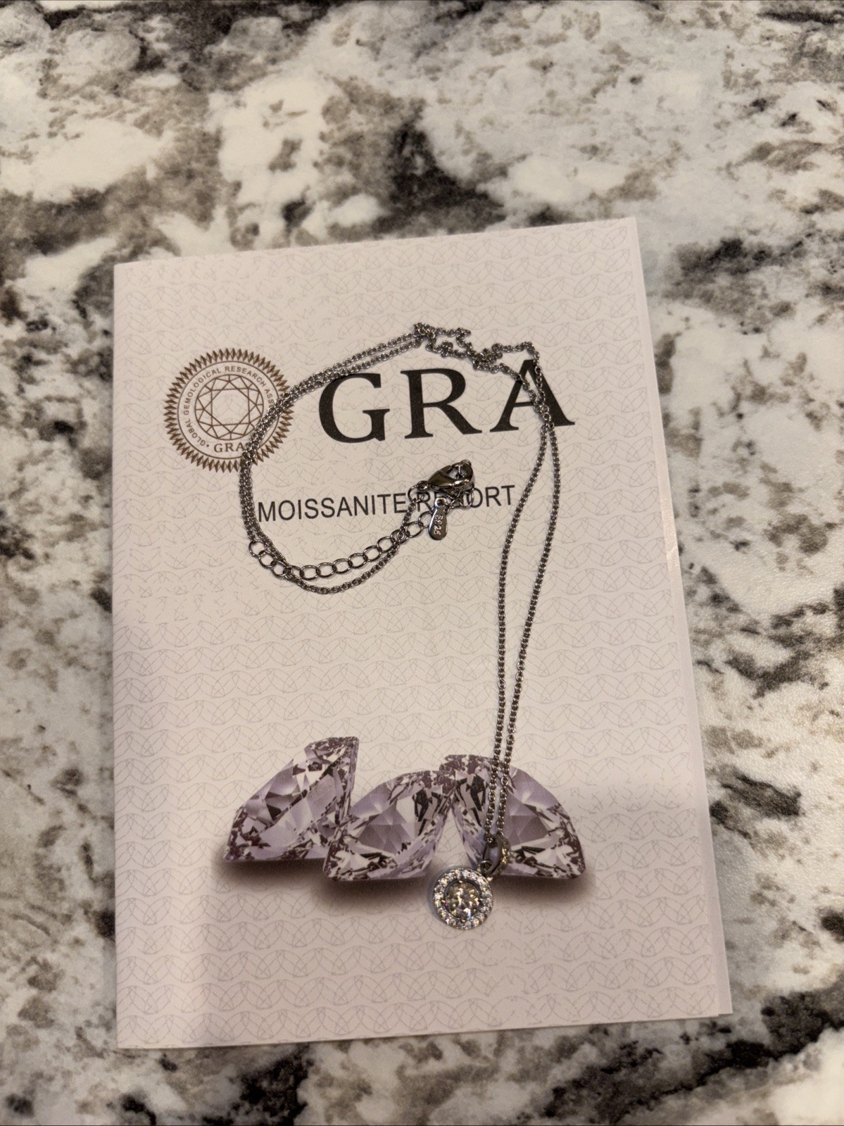 Silver necklace; Moissanite stone; 5mm round brilliant, .5 carat