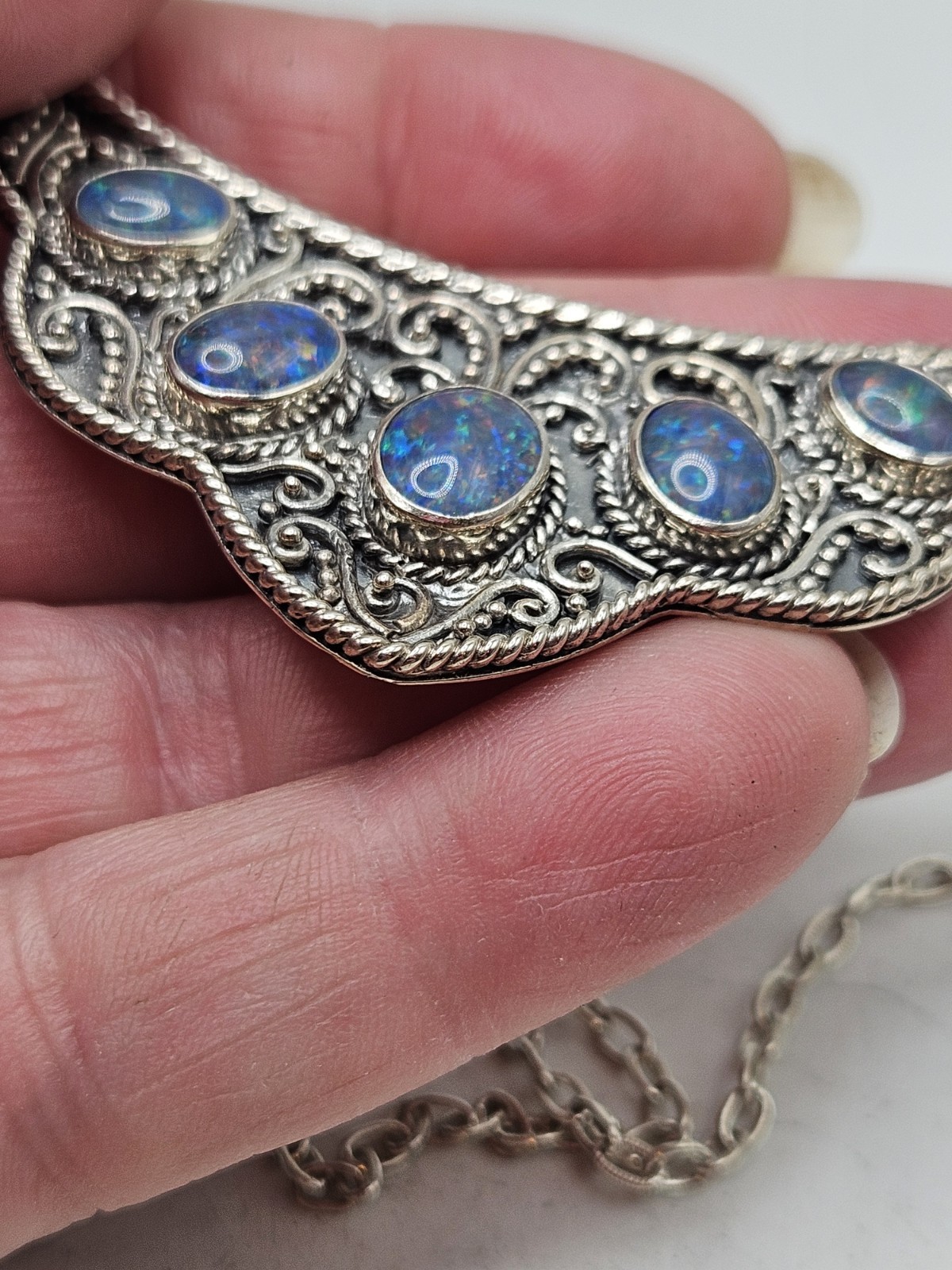 Sterling Silver Bib Style Necklace With 5 Oval Bezel Set Opals. 20″ Marked. 925.