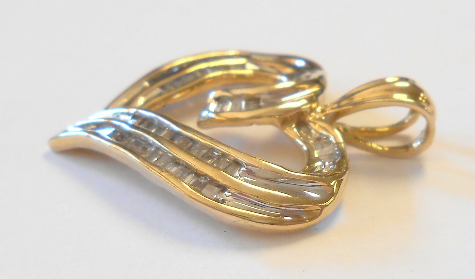 10k Yellow Gold Channel Set Baguette 1 TWD Carat Diamond Heart Pendant