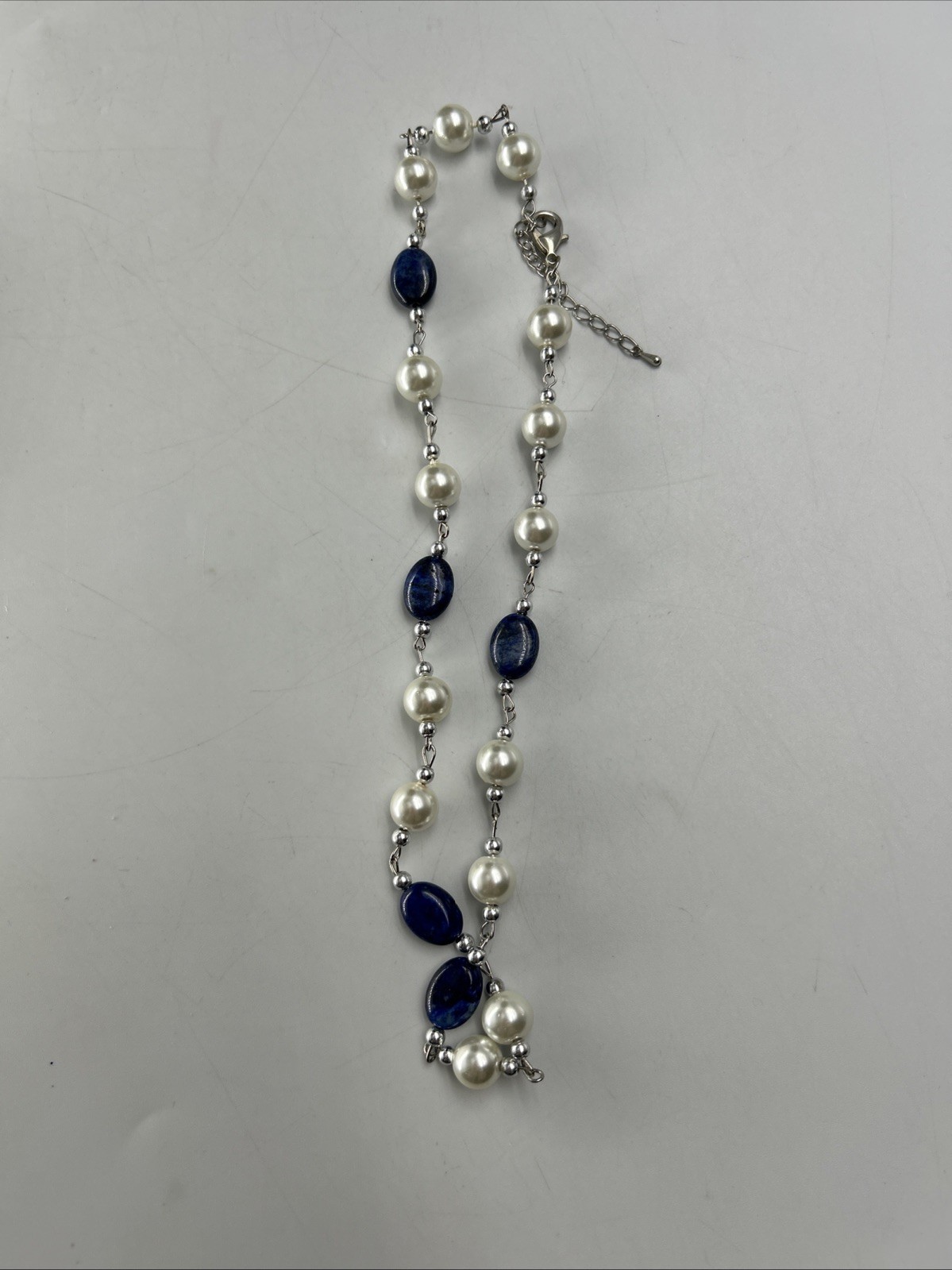 beautiful Fashion necklace with faux pearl and blue stones And Bracelet
