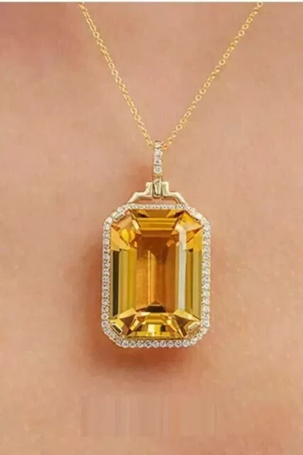 2.50Ct Emerald CutYellow Citrine Halo lab created 14K Yellow Gold plated