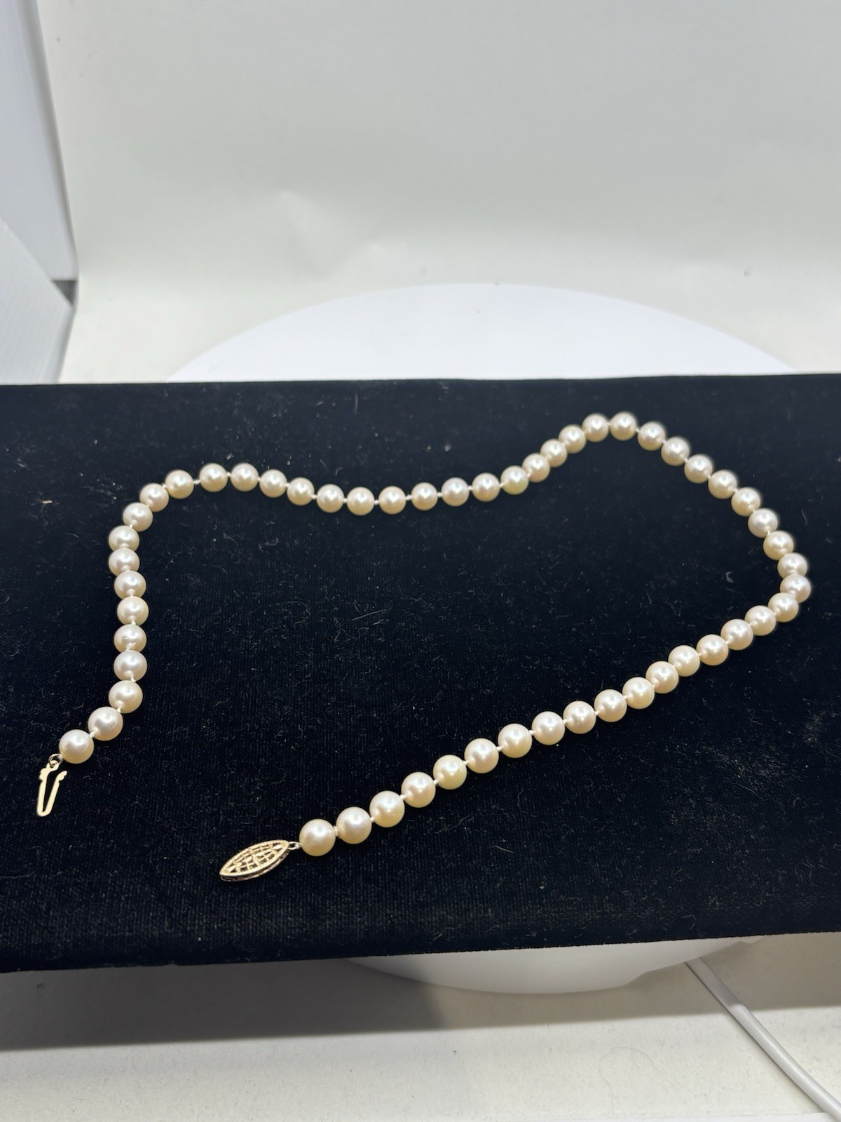 19 Inch Single strand akoya pearl necklace, 7 1/2-7 3/4 mm.