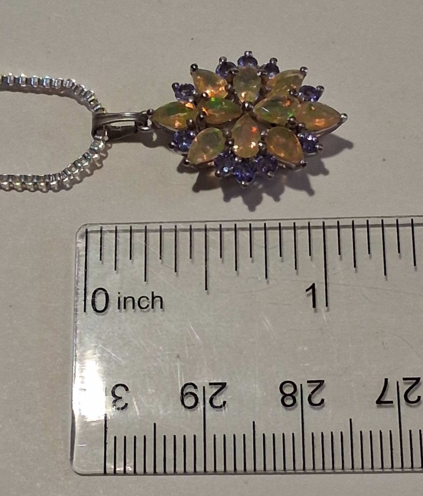 Jtv Ethiopian Opal And Tanzanite Pendant…