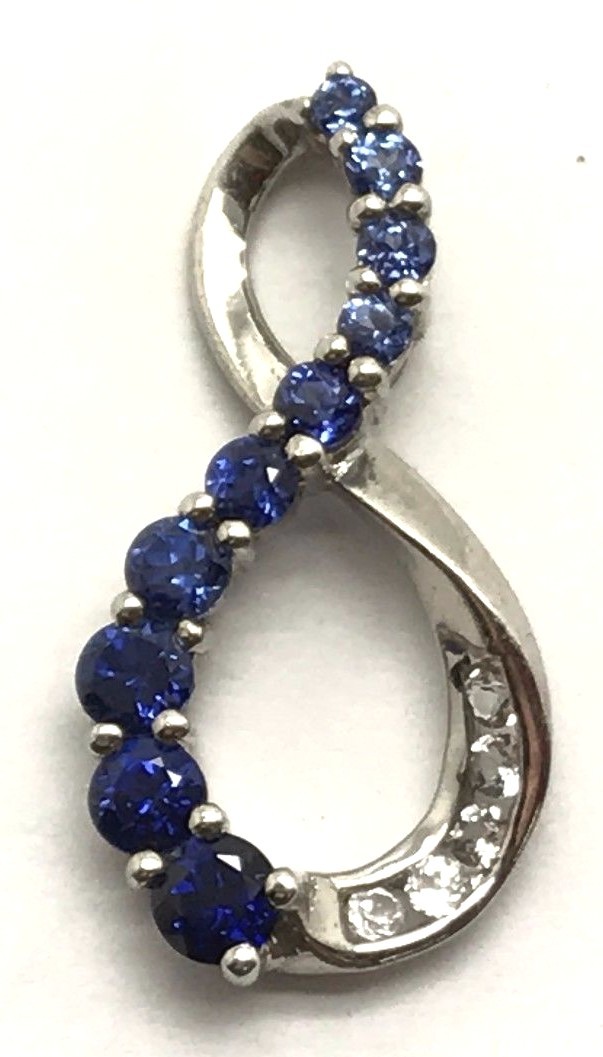 Sterling Silver Channel Set Descending Blue Tanzanite CZ Infinity Swirl Pendant