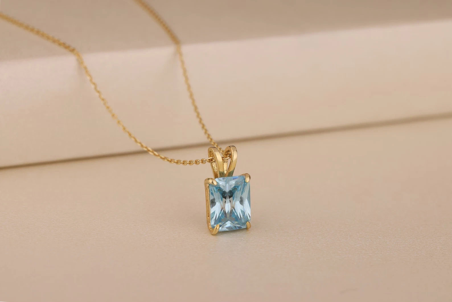 2 Ct Emerald Cut Lab Created Blue Topaz Women’s Pendant 14K Yellow Gold Plated