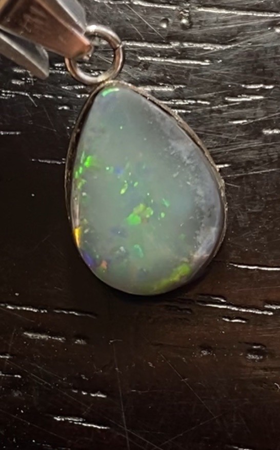 Solid Mintabie White Opal Pendant 14mmx10mm (video)