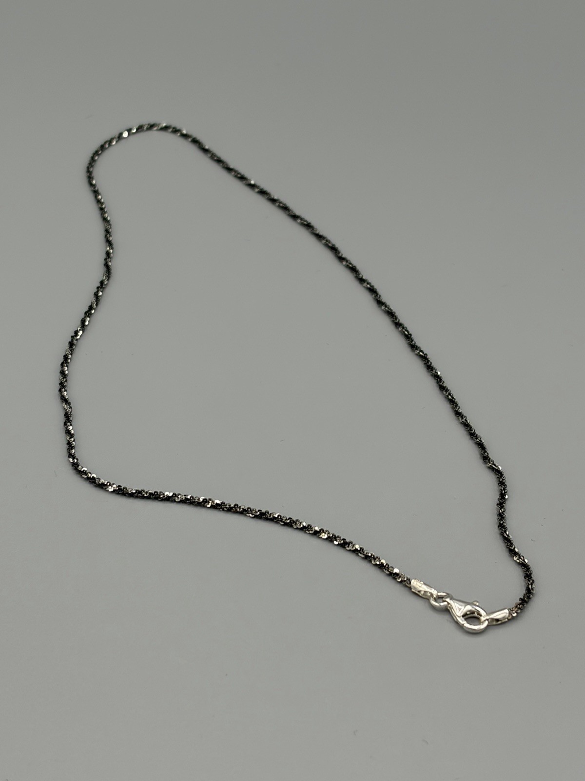 925 Sterling Silver TWISTED ROCK (Diamond Cut) 1.2 mm CHAIN w/ Black Rhodium 16″