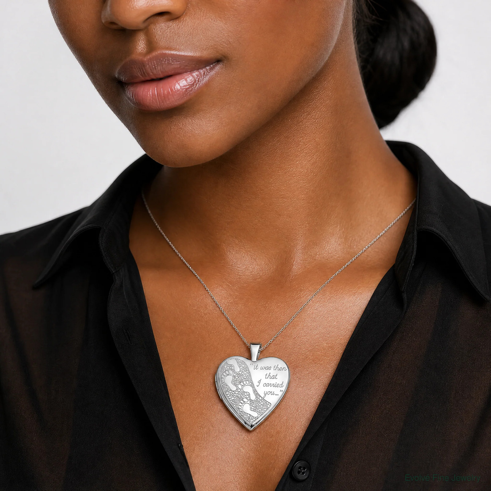 Sterling Silver Rhodium-Plated 20mm Footprints Heart Locket