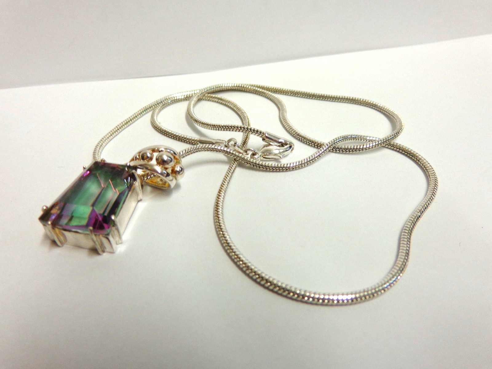 sterling silver mystic topaz necklace sz 21 in lg w/1.25 in pend/wgt 16 gr tcw 6