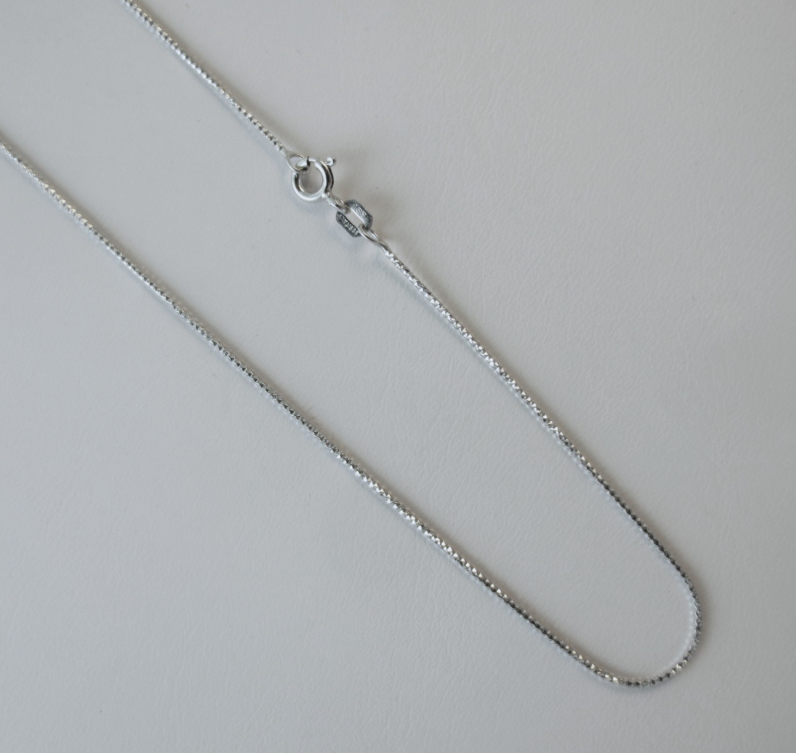 Diamond-cut Snake Chain 1mm Italian Rhodium over Sterling Silver. 16,18,20,24″