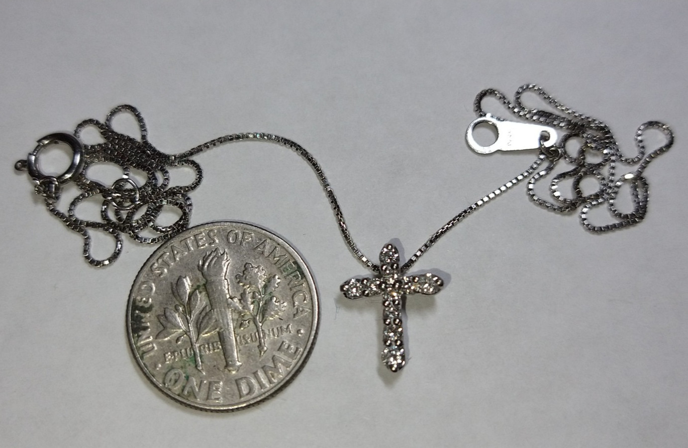 Solid platinum 0.20 carat natural diamond cross necklace 2.56 grams 15.75″