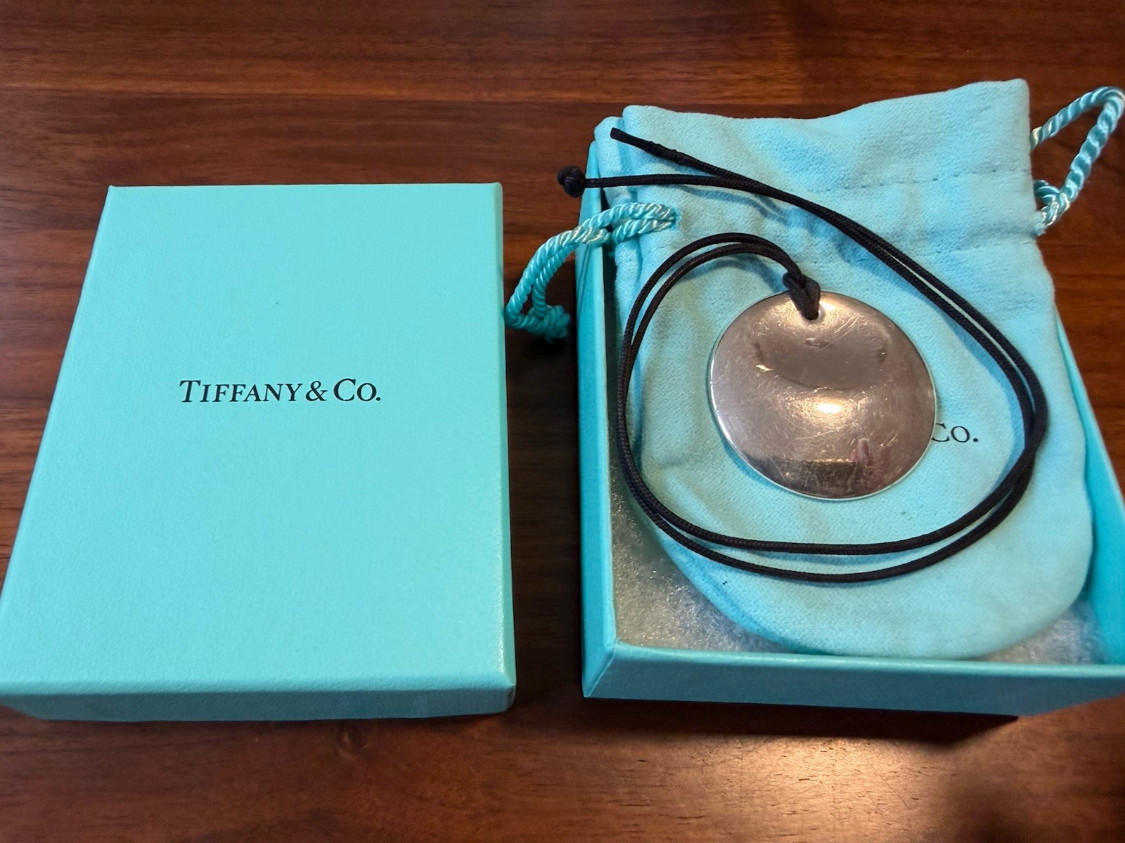 Tiffany & Co. Signed 925 Sterling Silver Round Disc Pendant Black Cord Necklace