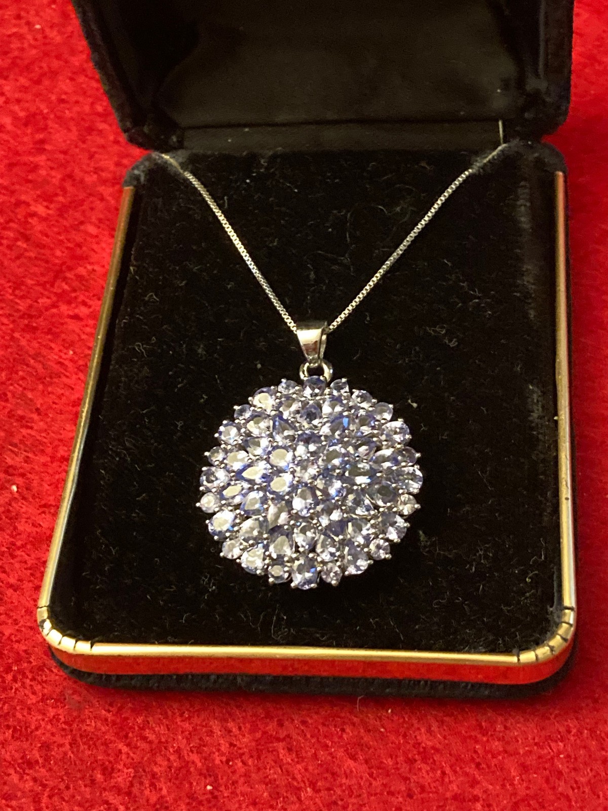 STERLING SILVER CLUSTER PENDANT NECKLACE WITH MULTIPLE LIGHT COLORED STONES