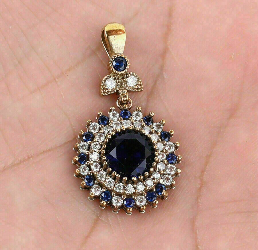 2.50Ct Round Cut Blue Sapphire Women’s Pendant 14K Yellow Gold Over Free Chain