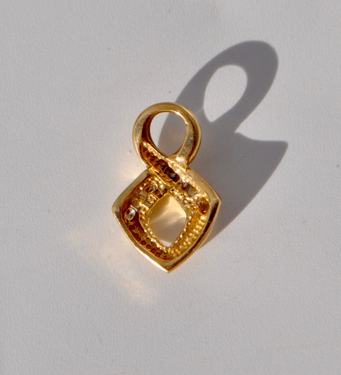 14k Solid Gold Natural Diamond Pendant – Twist Infinity Channel Set Yellow Gold
