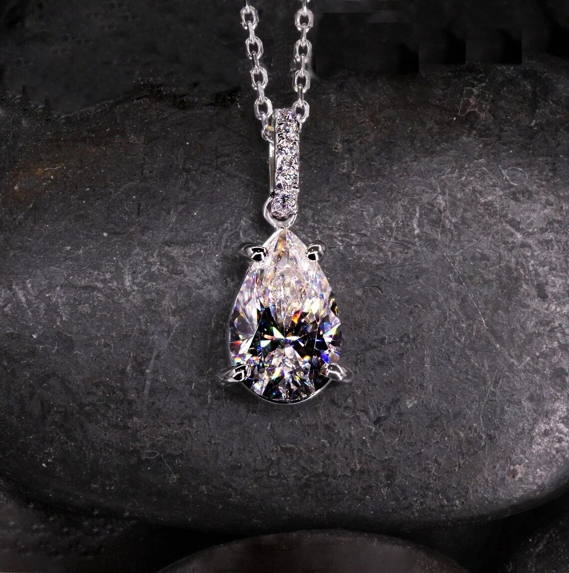 2 Ctw Pear Cut VVS1 Moissanite Solitaire Pendant 14K White Gold Plated 18″ Chain