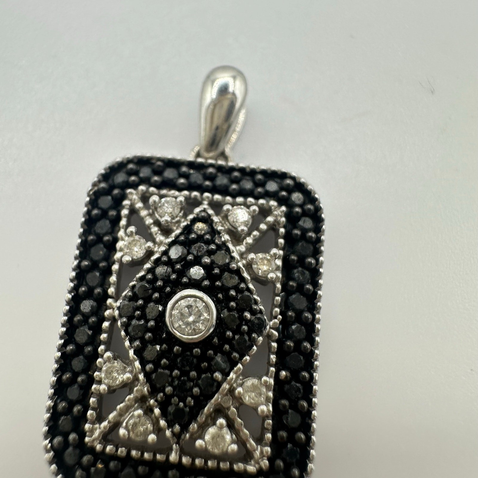 14kt solid white gold white black diamonds treated 0.50CTW pendant 3.13 grams
