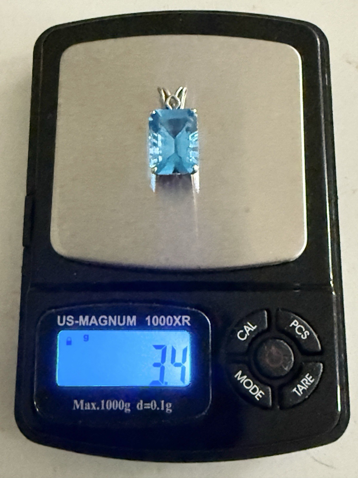 14k White Gold Blue Topaz Pendant – Emerald Cut- Nice