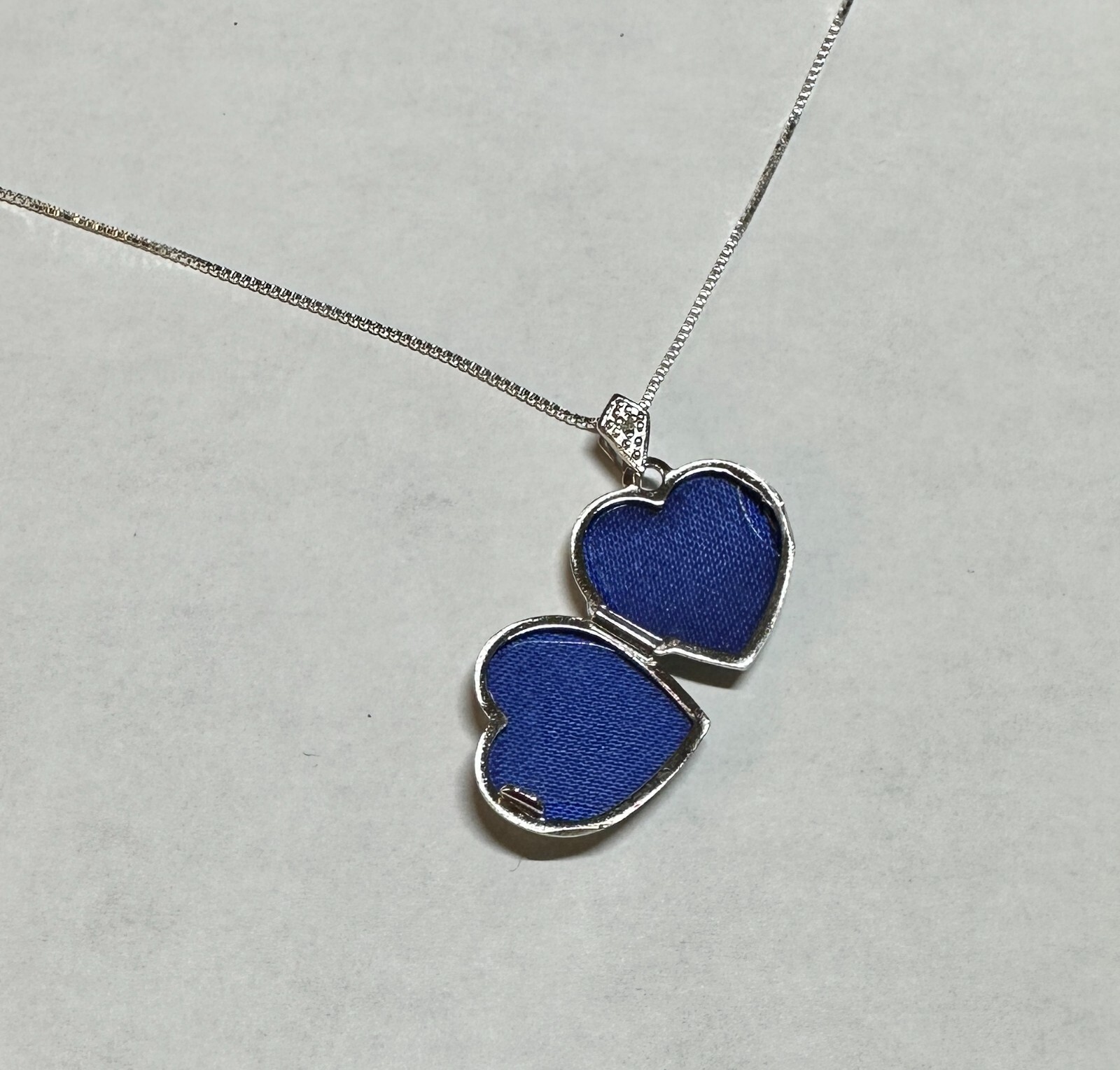 Ster Silver Rhodium-plated Genuine Diamond 15mm Filigree Heart Locket w/Chain
